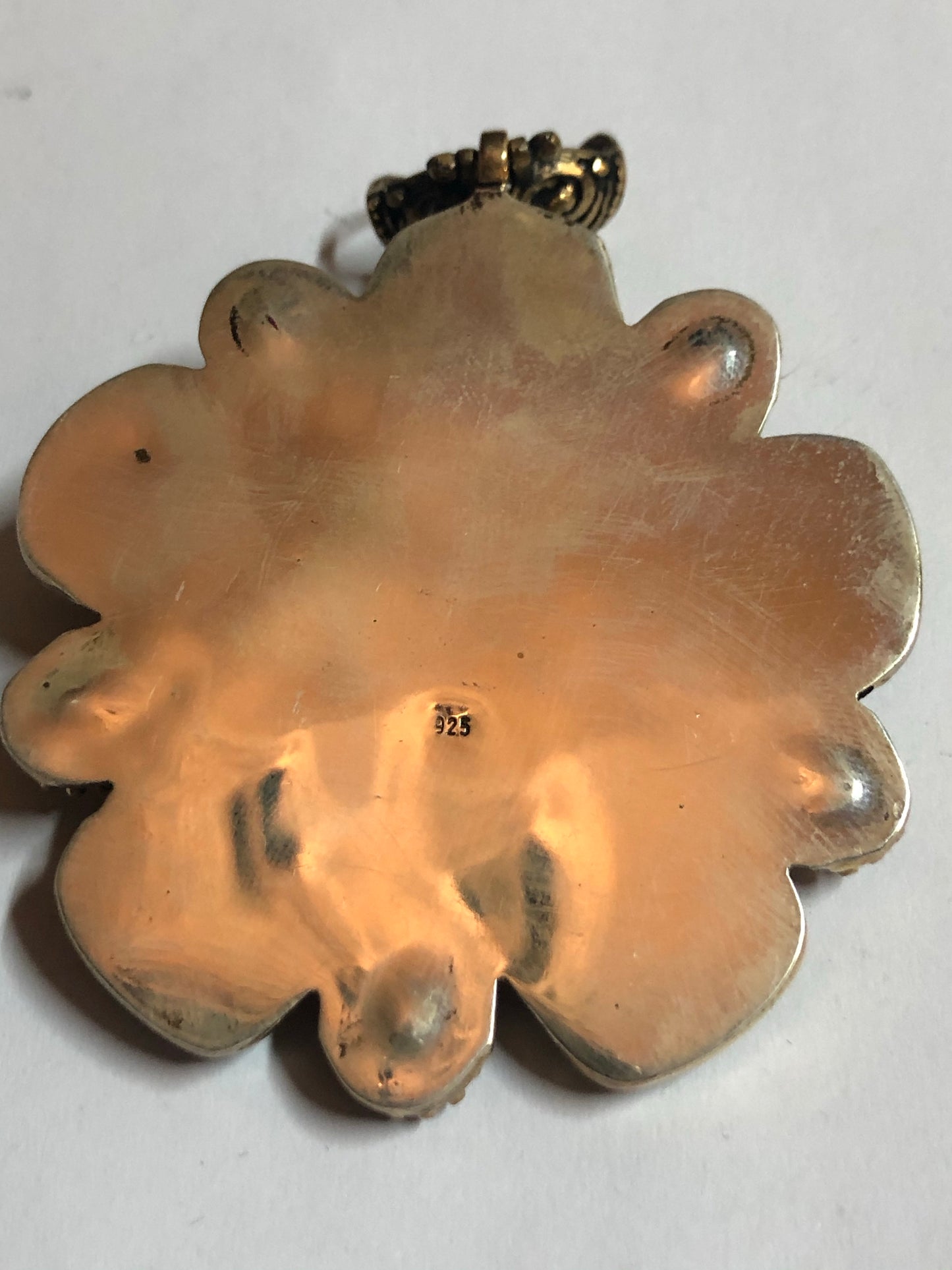 A 925 Silver Pendant with Sapphire stones.