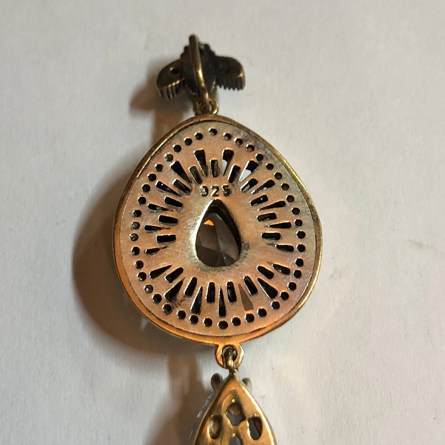 A 925 Silver Pendant with Sapphire stones.