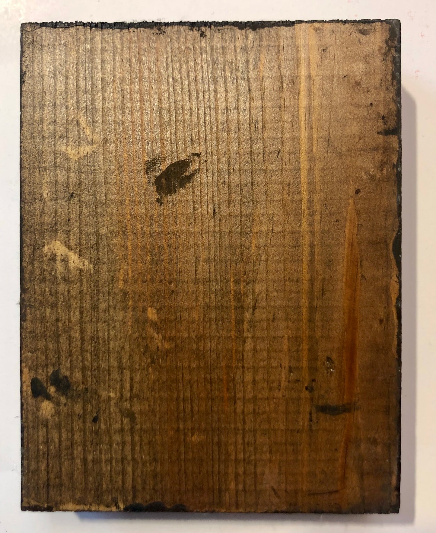 A Russian Enameled icon of St. John The Evangelist, wood carved.