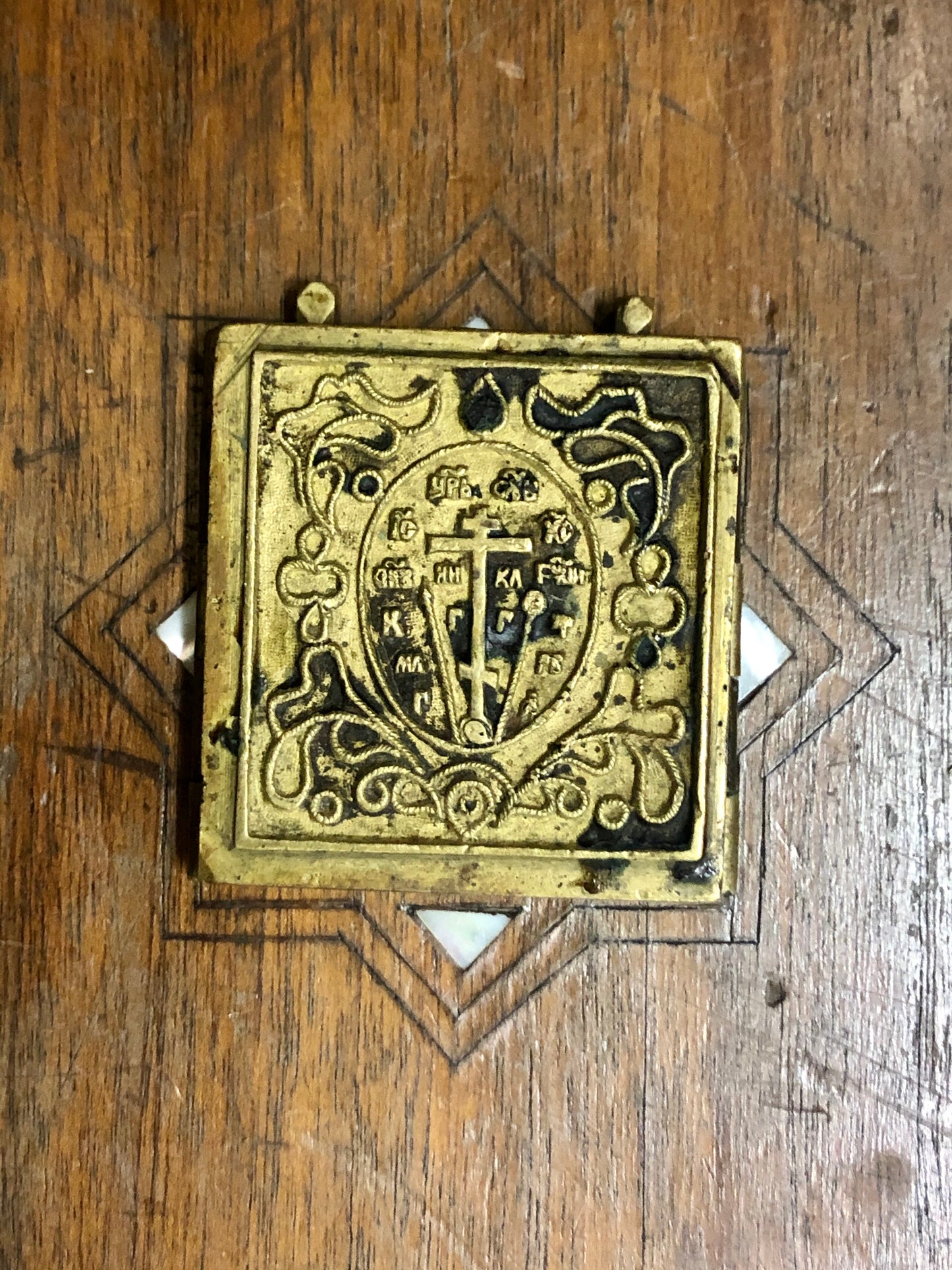 A handmade Bronze Russian Folded icon of the Dormition of Virgin Mary, Jesus's Transfiguration and The Baptism. 18th Century.