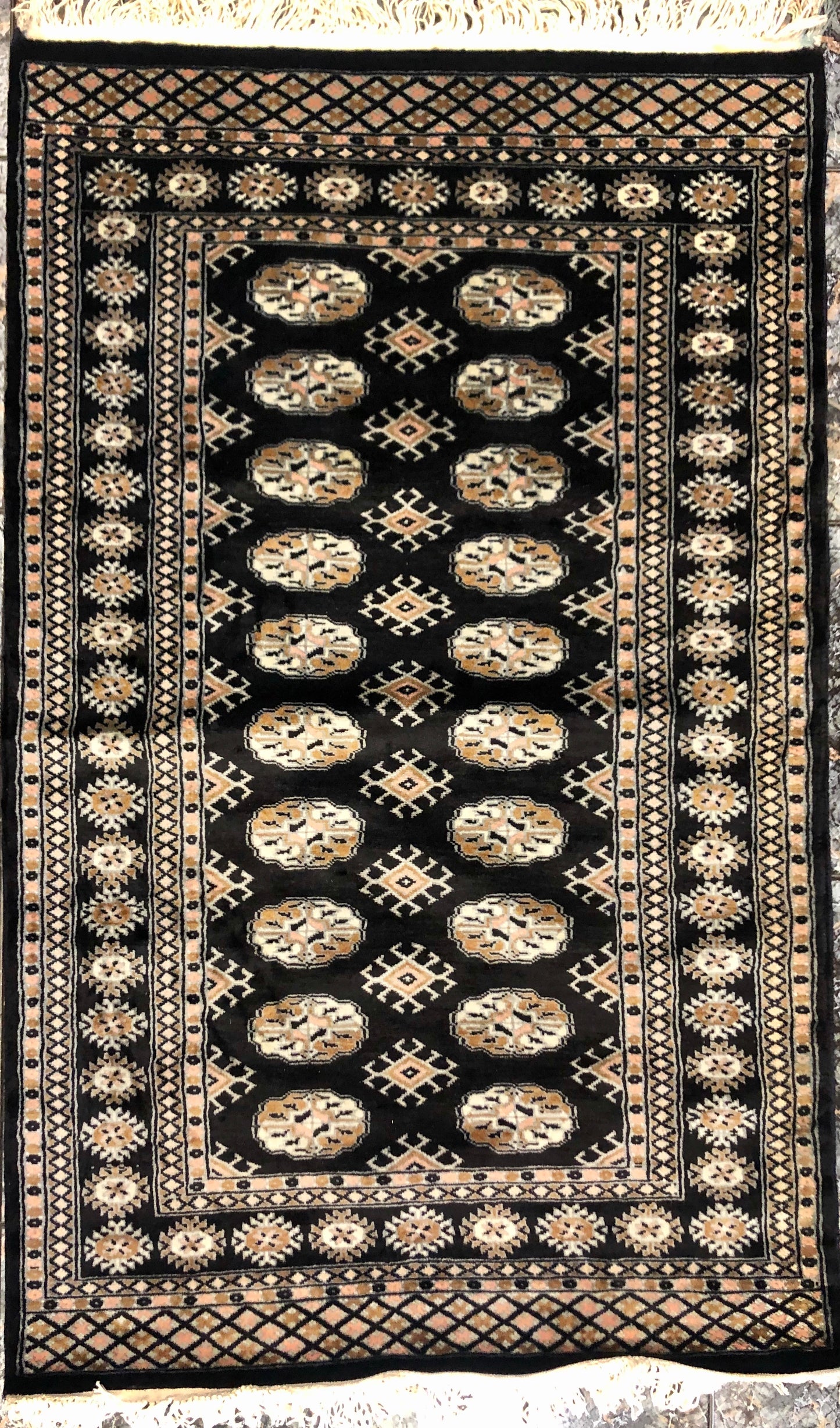 A handmade Pakistani Wool Carpet.