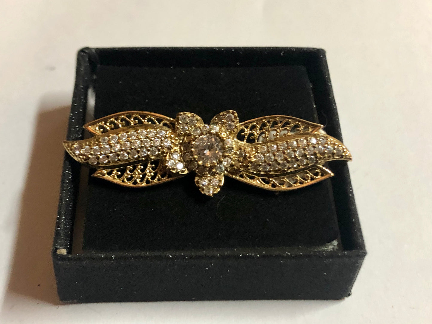 A 925 Silver Brooch with Sapphire stones.