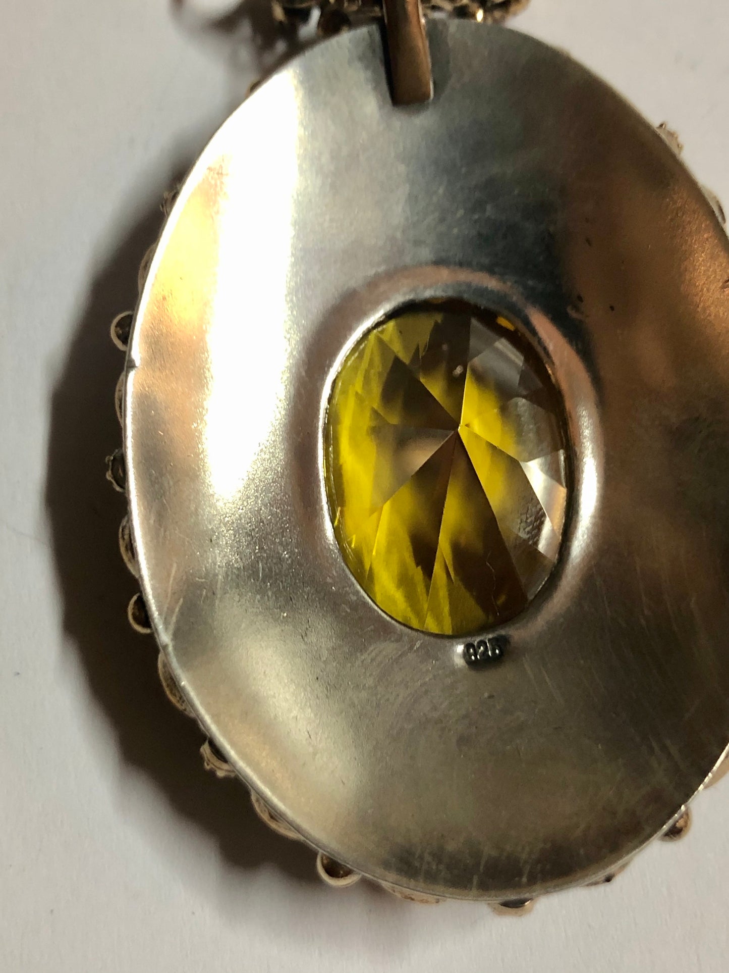 A 925 Silver Pendant with Sapphire stones.