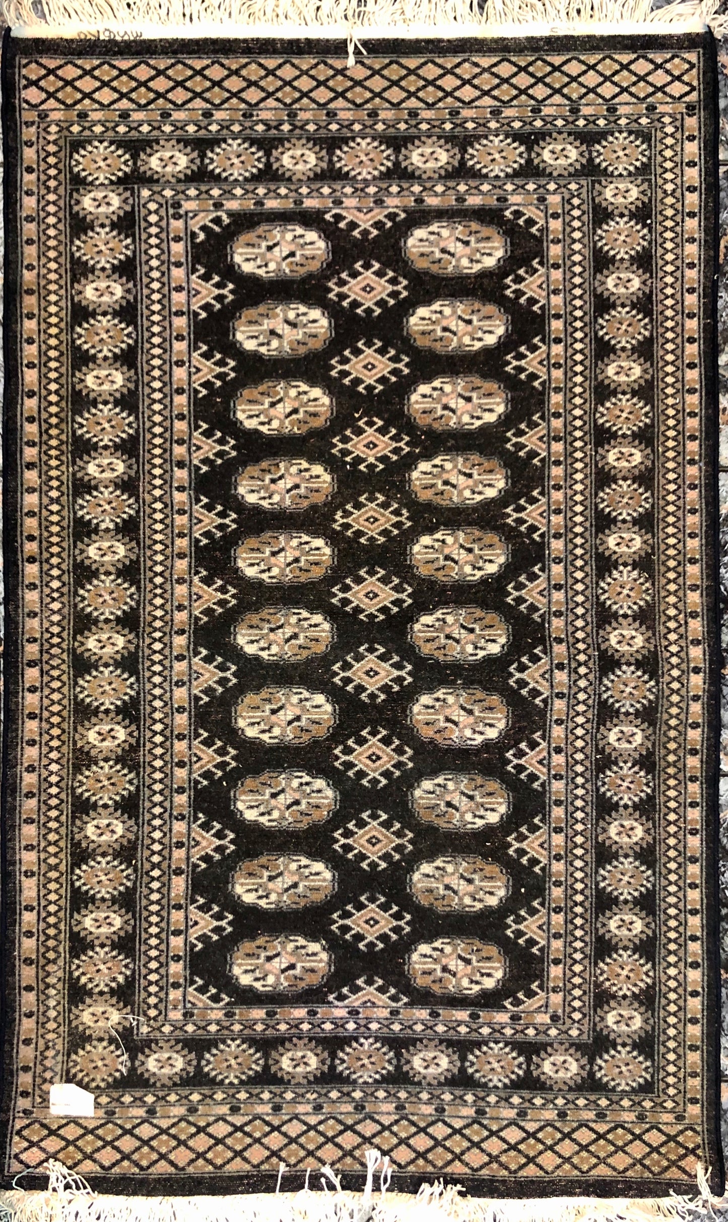 A handmade Pakistani Wool Carpet.