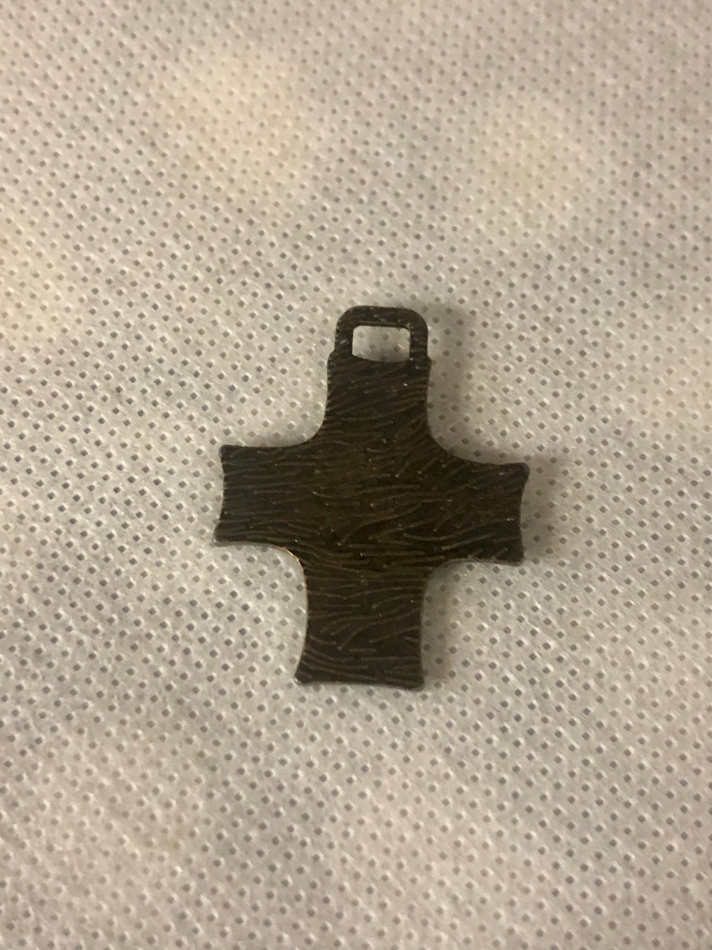 A 925 silver cross pendant.