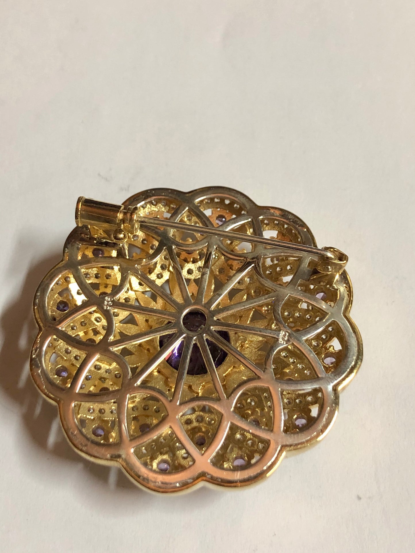 A 925 Silver Brooch with Sapphire stones.