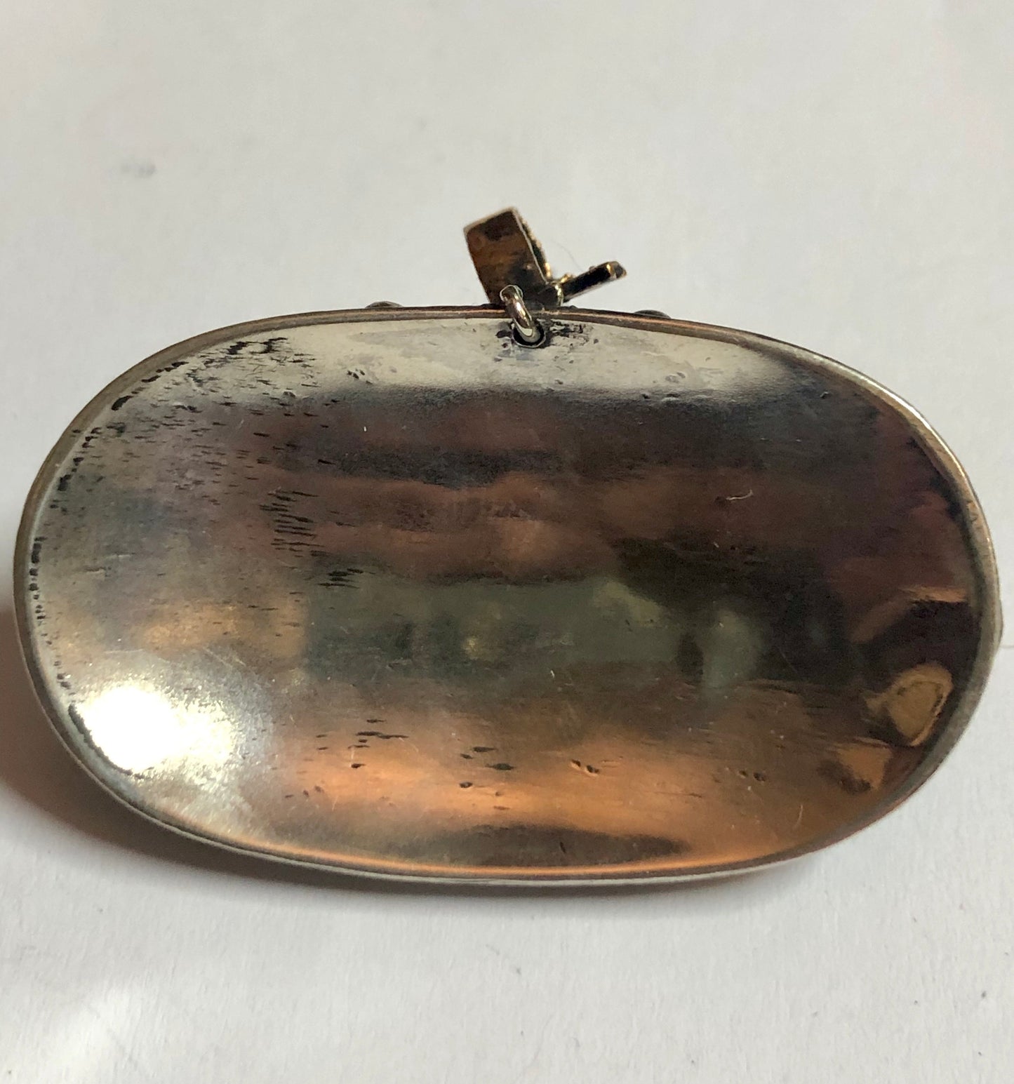 A 925 Silver Pendant with Sapphire stones.