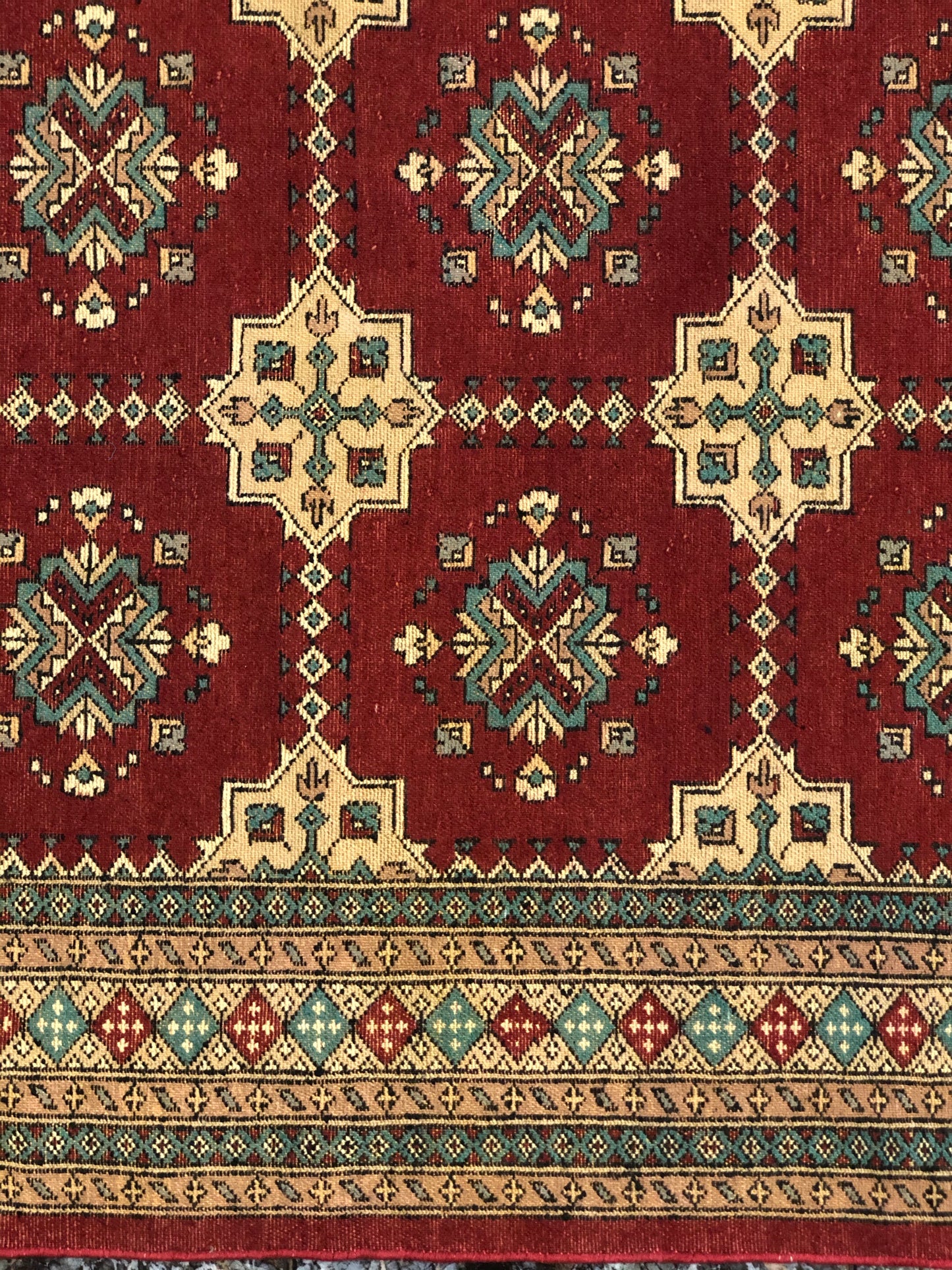 A handmade Pakistani Wool Carpet.