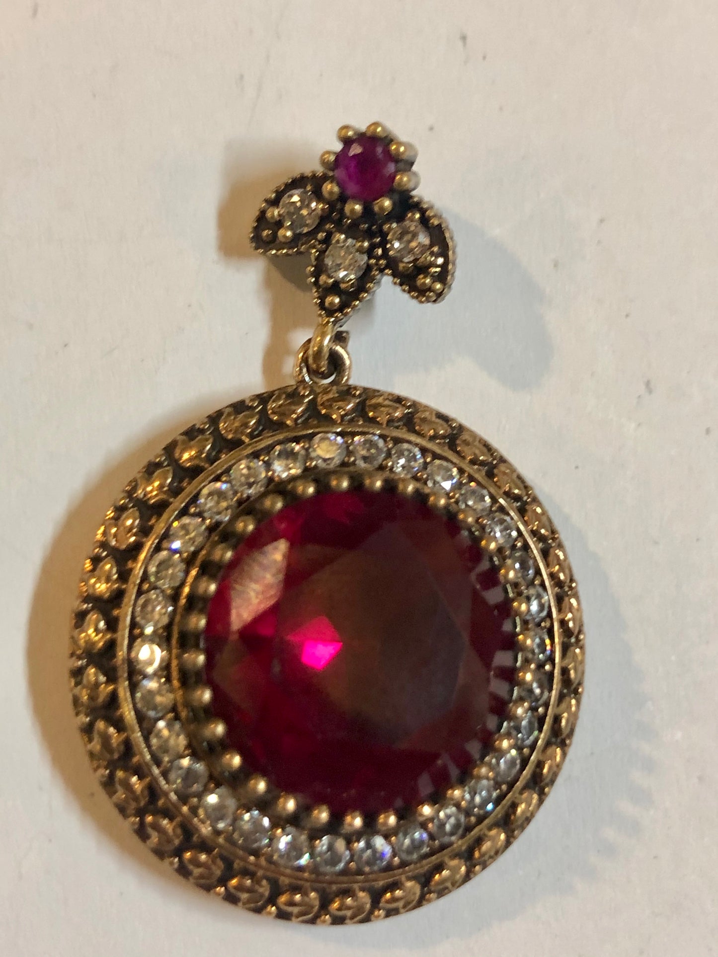 A 925 Silver Pendant with Sapphire stones.