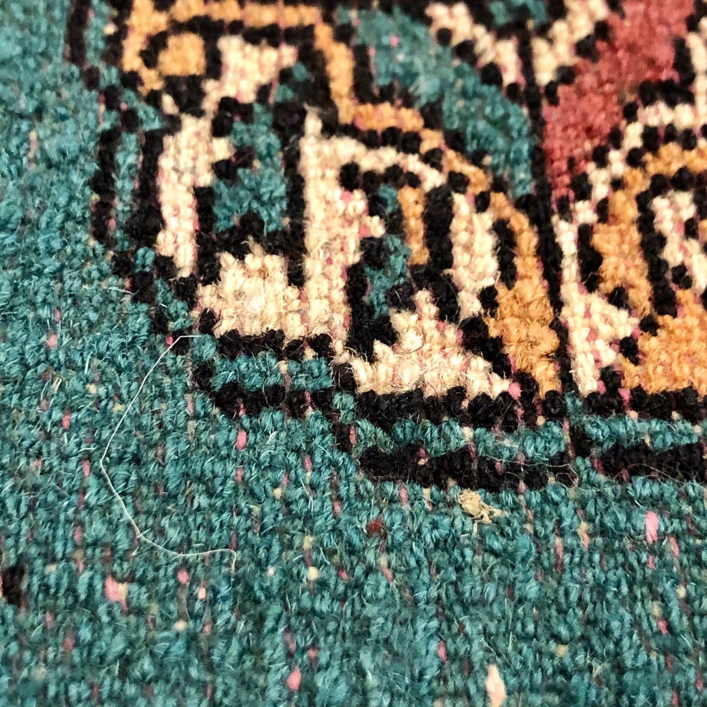 A handmade Pakistani Wool Carpet.