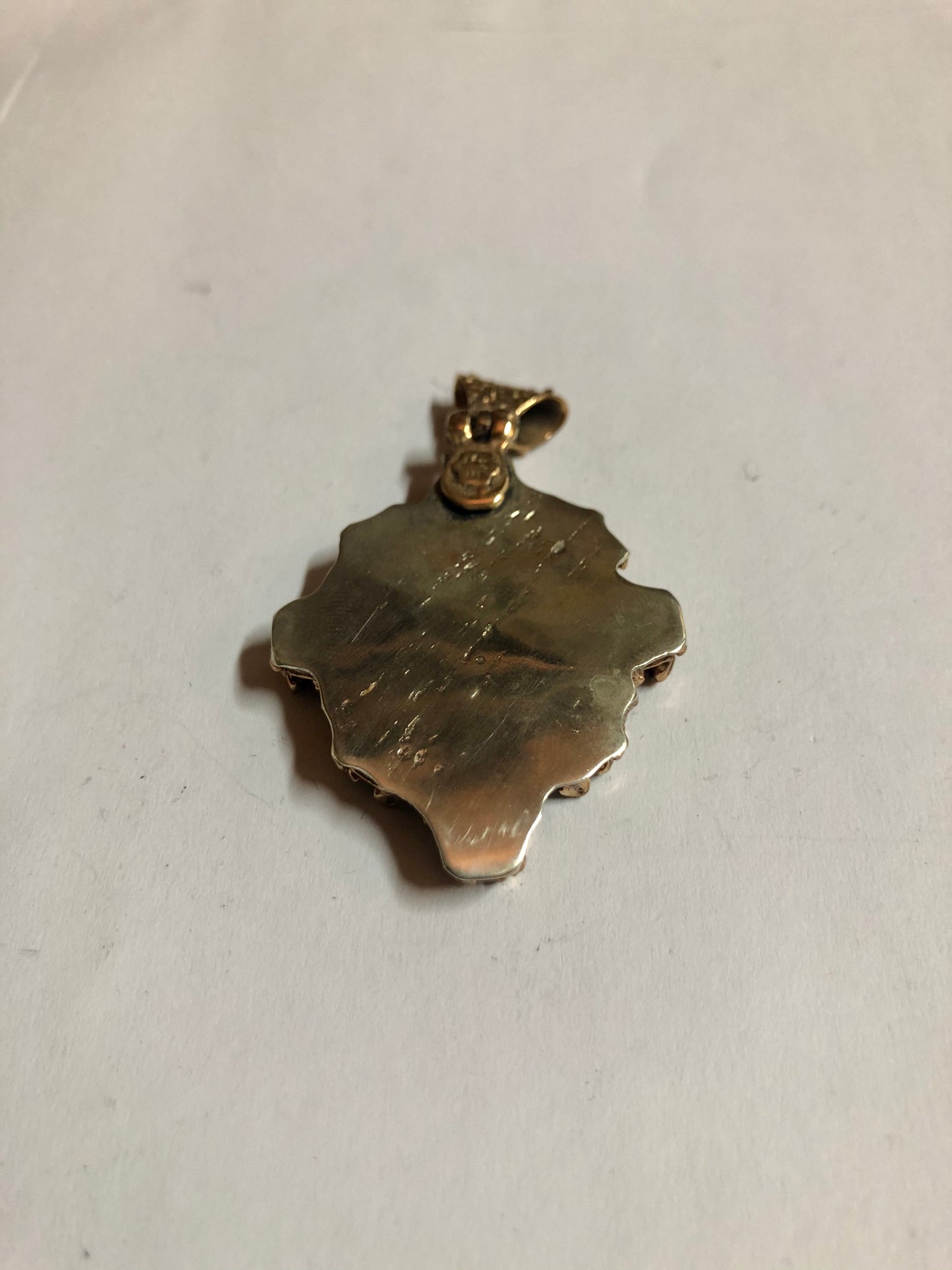 A 925 Silver Pendant with Sapphire stones.