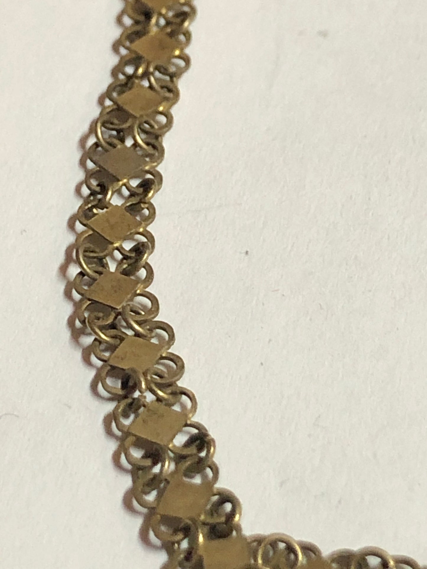 A silver-gold plated necklace, antique silver with Turquoise stones.