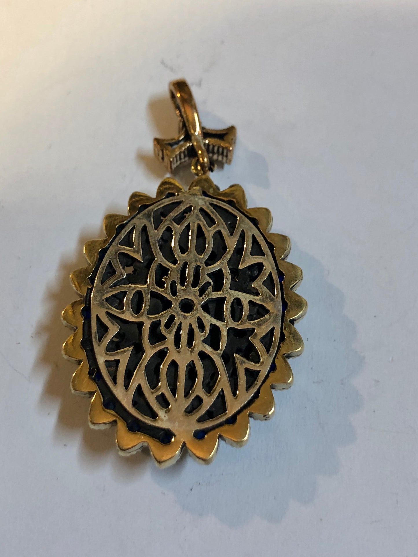 A 925 Silver Pendant with Sapphire stones.