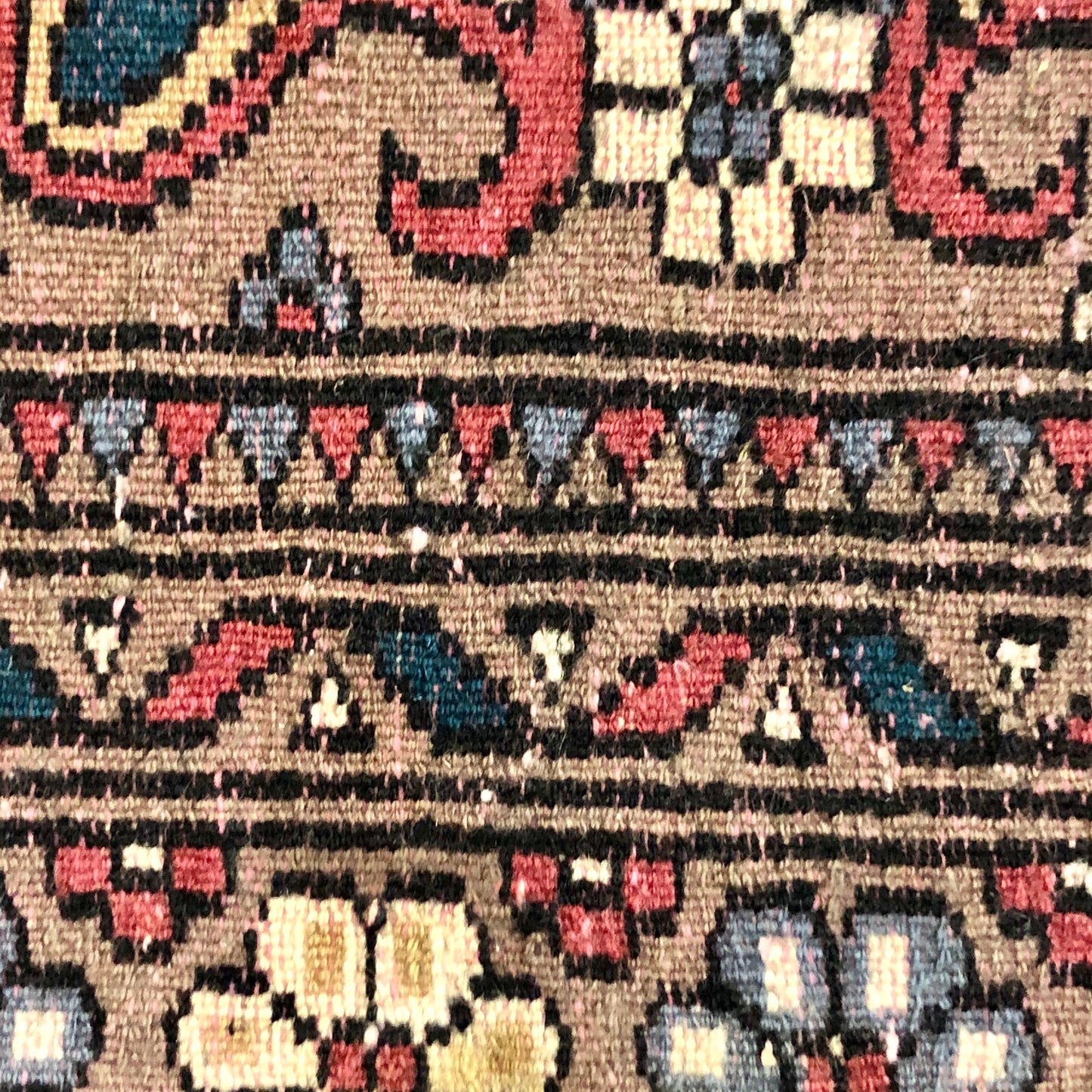 A handmade Pakistani Wool Carpet.