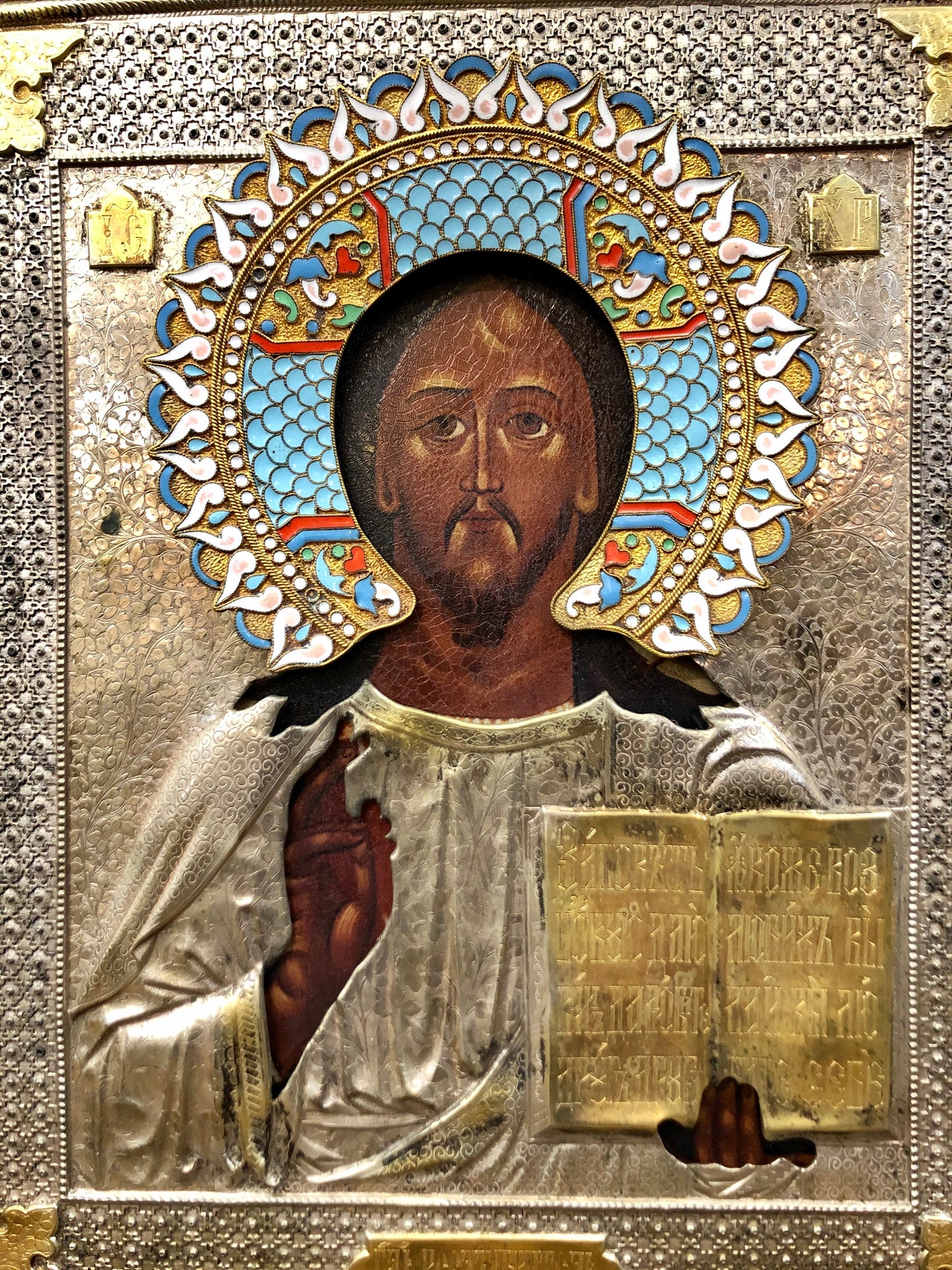 A Russian Enameled-Silver Stamped Pair of the Wedding icon of Jesus Christ and Mother of God 19th Century.