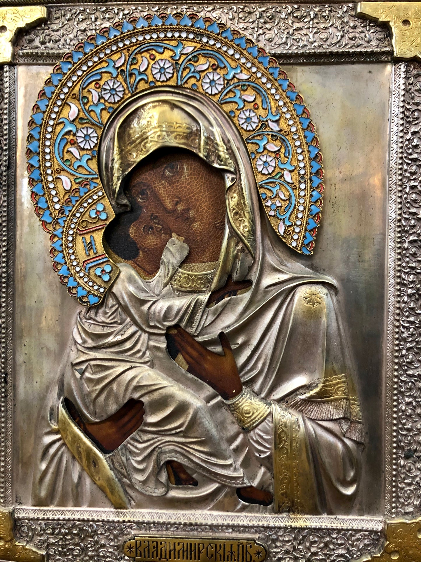 A Russian Enameled-Silver Stamped Pair of the Wedding icon of Jesus Christ and Mother of God 19th Century.