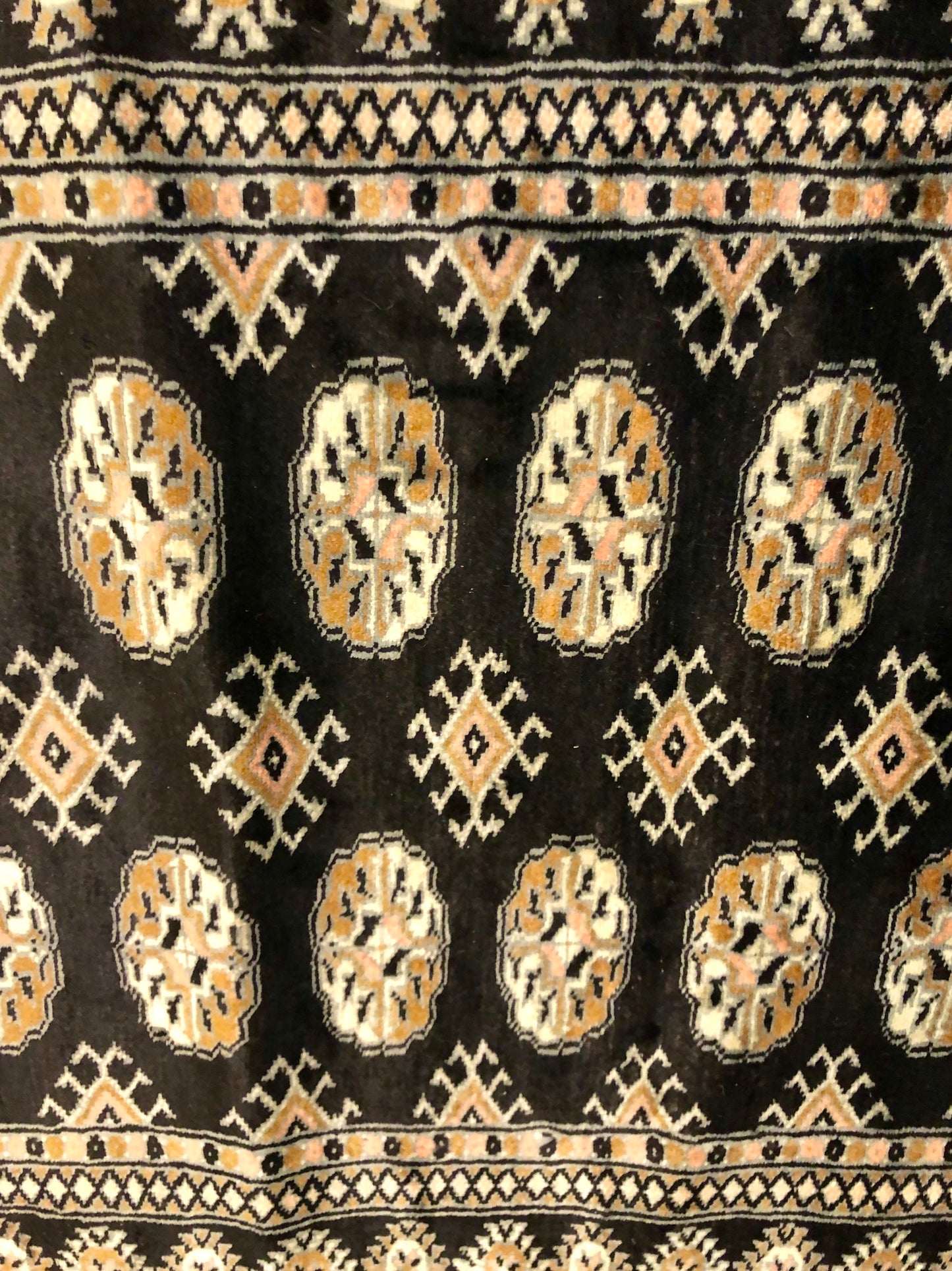 A handmade Pakistani Wool Carpet.