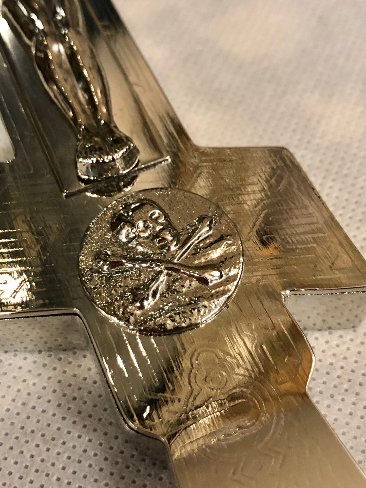 A 925 Silver Cross with the depictions of Jesus’s crucifixion.