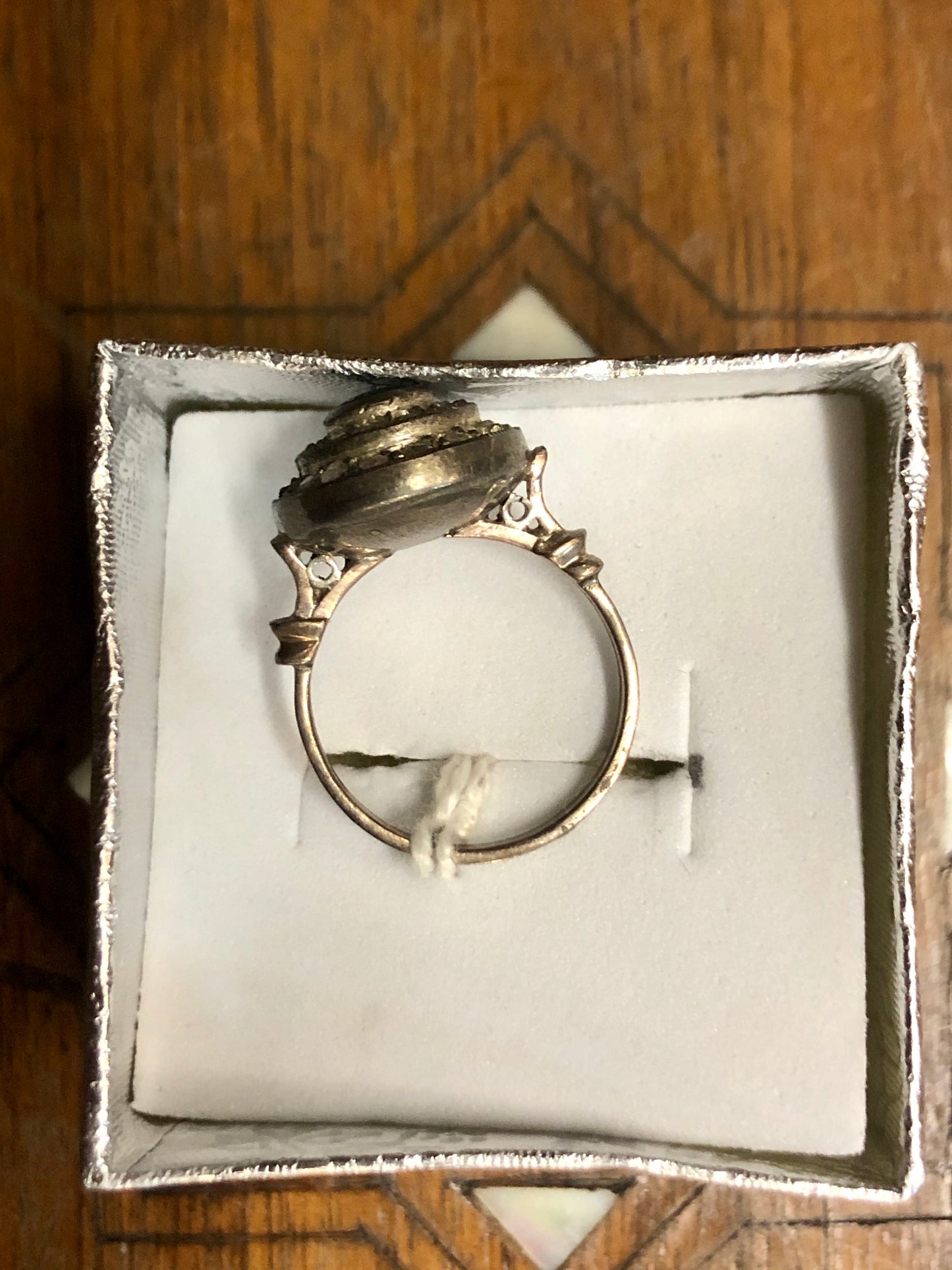 A Golden Ring with Emeralds Stones and Diamonds. 8K