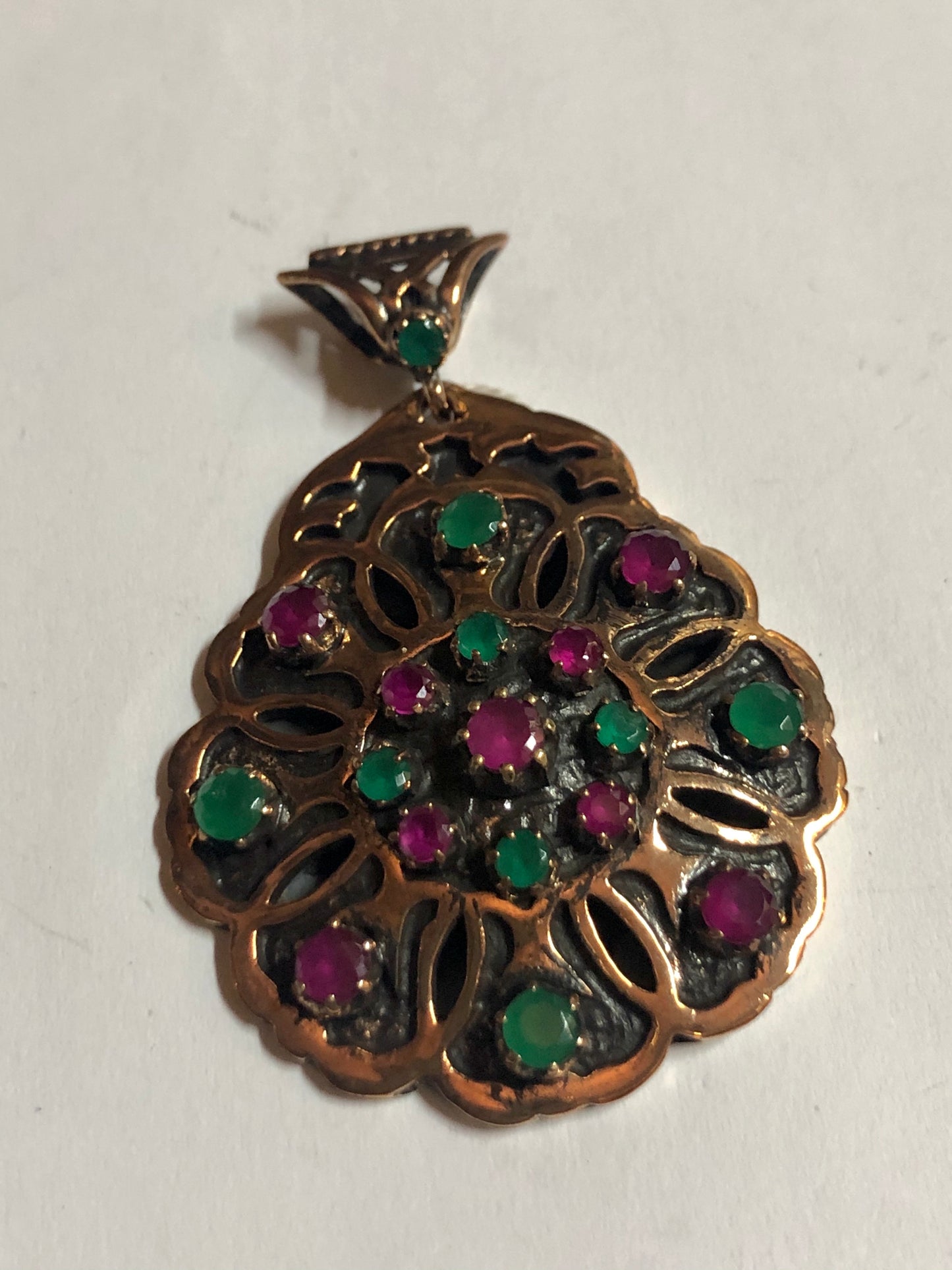 A 925 Silver Pendant with Sapphire stones.