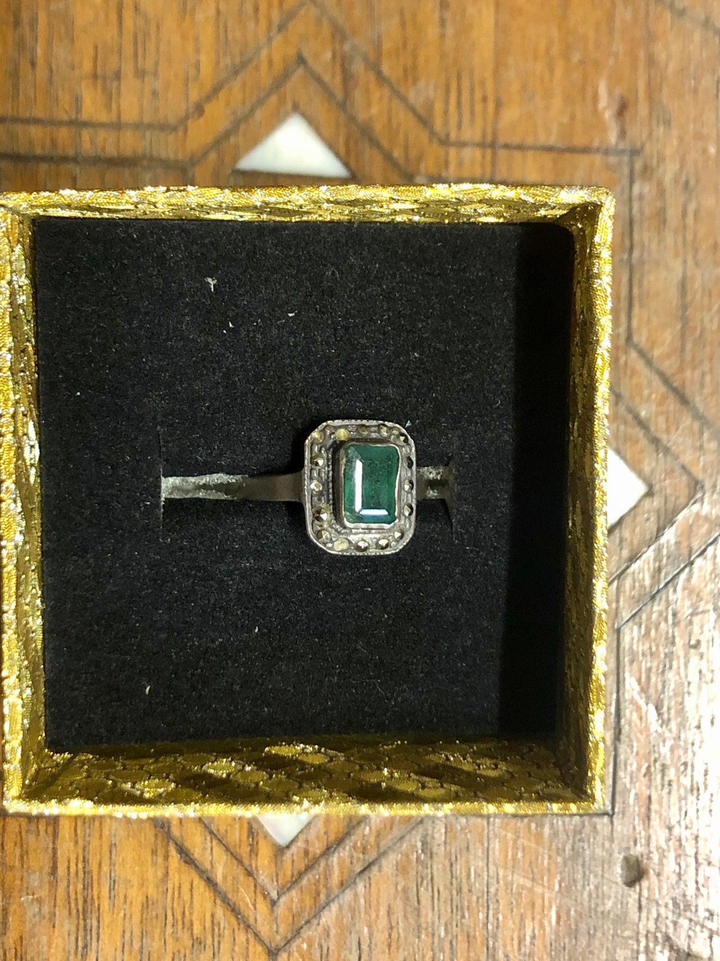 A Golden Ring with Emeralds Stones and Diamonds. 8K