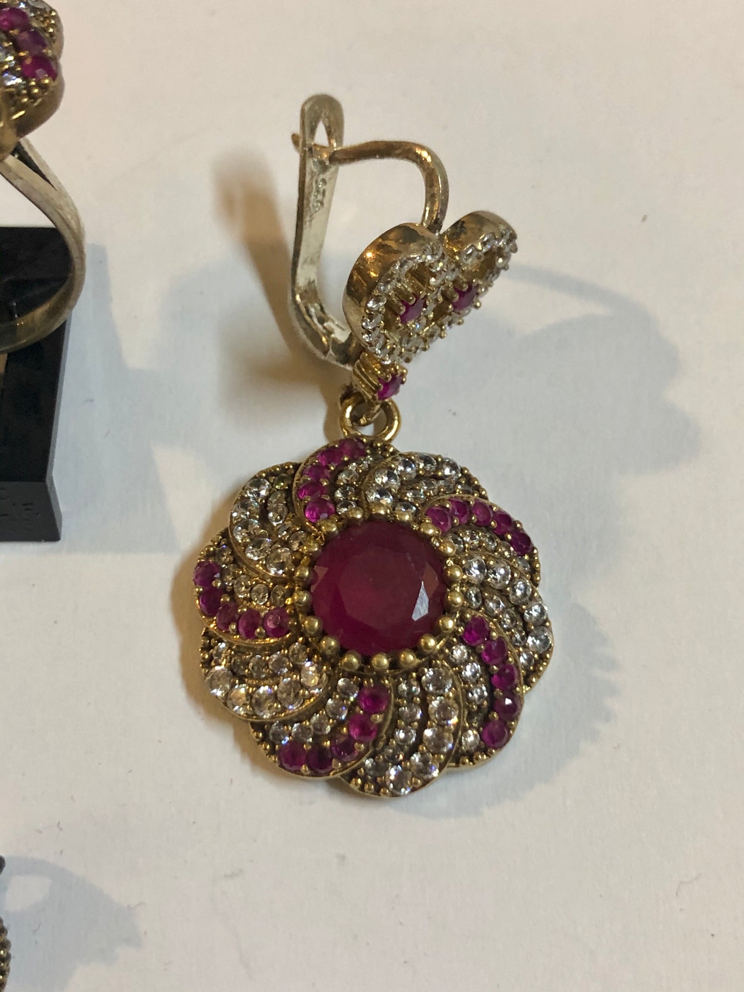 A 925 Silver set of a Ring, Earrings and a Pendant with Sapphire Stones.