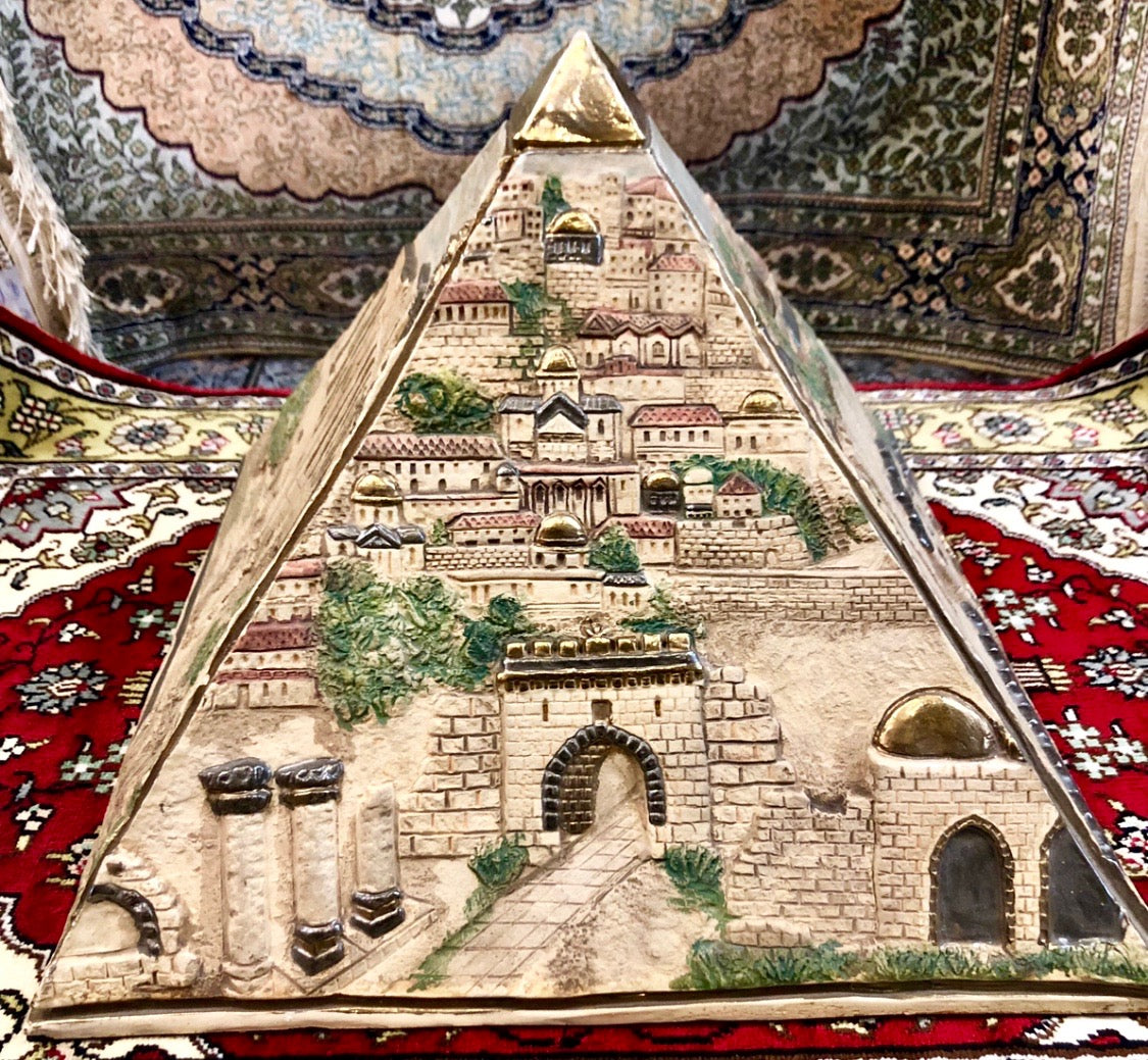 A Pyramid of The Holy City. Made out of Clay, covered with Platinum and Gold of 24 Carat.