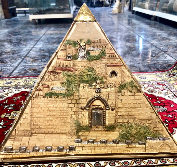 A Pyramid of The Holy City. Made out of Clay, covered with Platinum and Gold of 24 Carat.