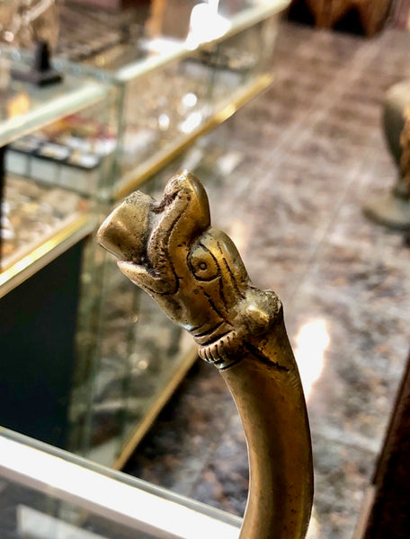 A Golden Bronze Jog displayed in the shape of a Goose. Handmade Bronze Item.