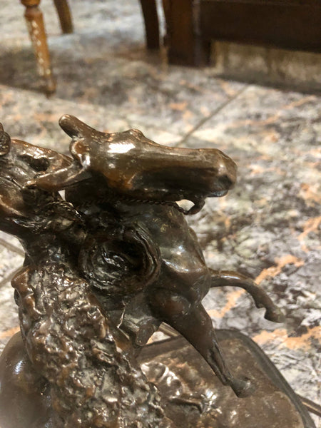 A knight riding on a horseback, Bronze Statue.