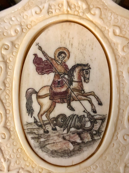 St. George killing a dragon, handmade icon painted and sculptured on Ivory. Late 19th Century.
