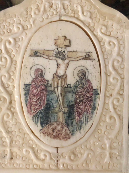 The Crucifixion of Jesus Christ, handmade icon painted and sculptured on Ivory. Late 19th Century.