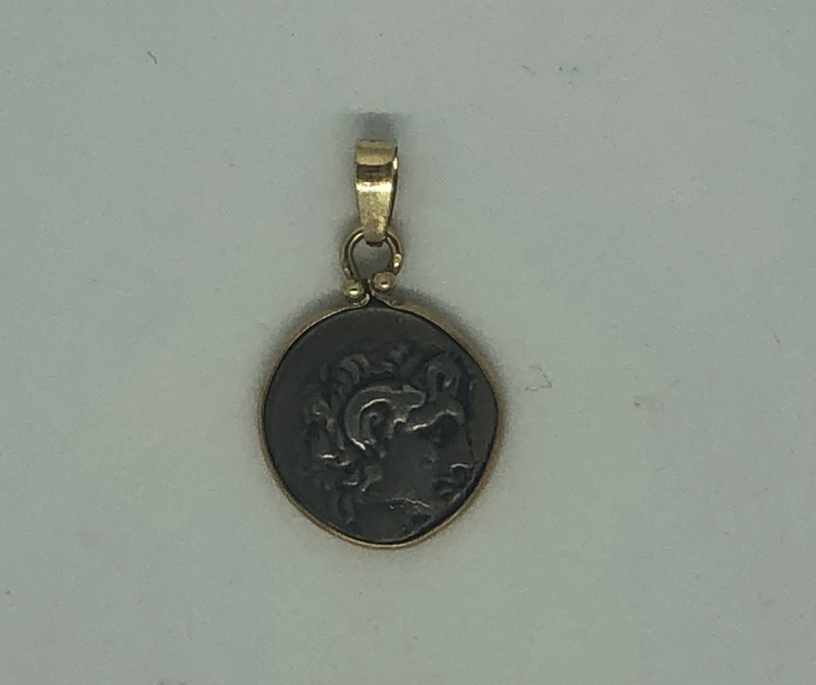 A Pendant of Alexander The Great, the half drachma, 14k.