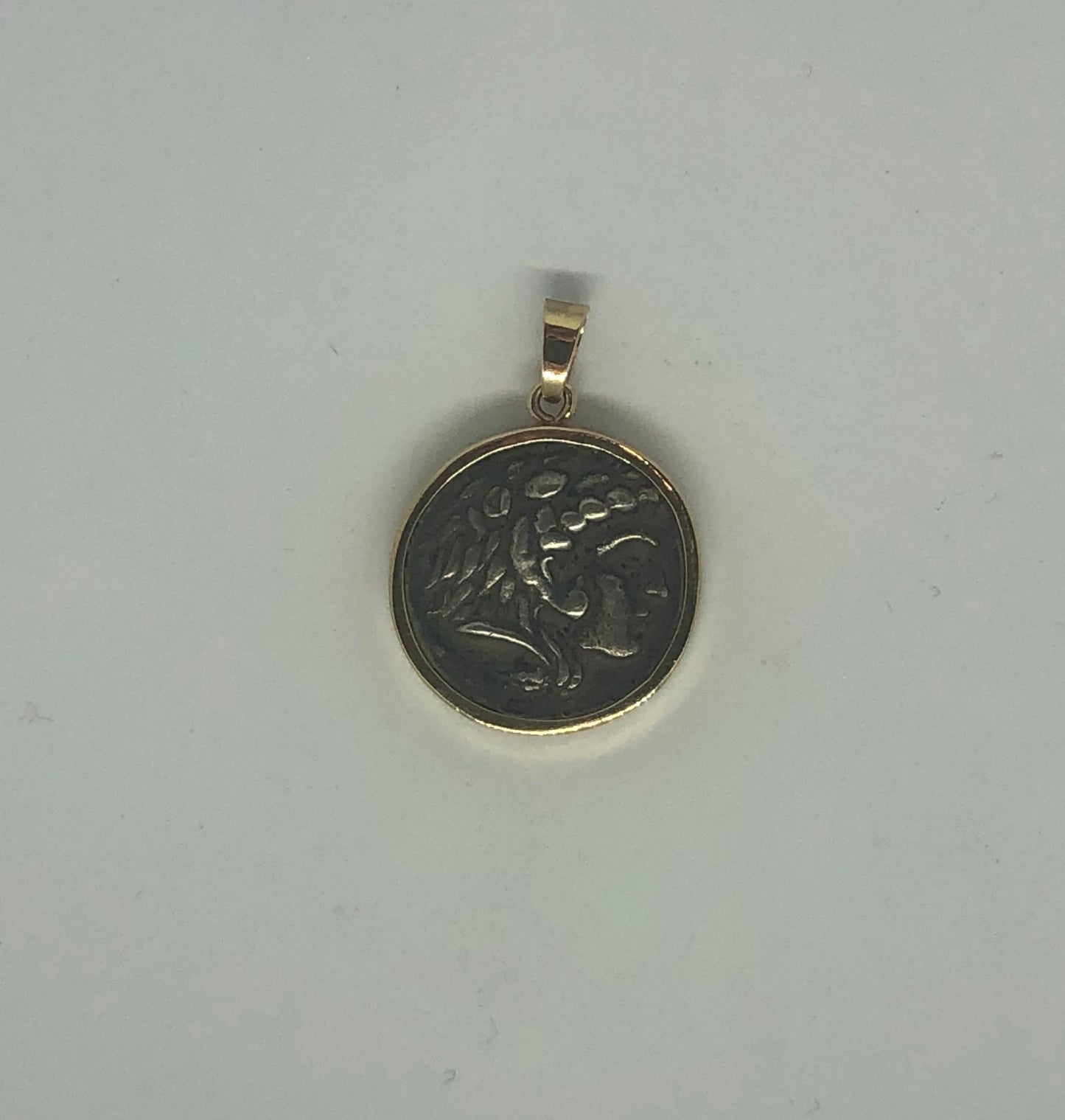 A Pendant of Alexander The Great, the full Drachma, 14k.