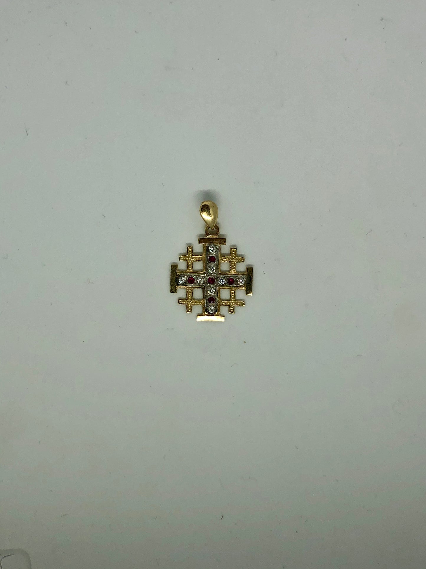 Rube Cross with Diamonds all over the cross, 14k.