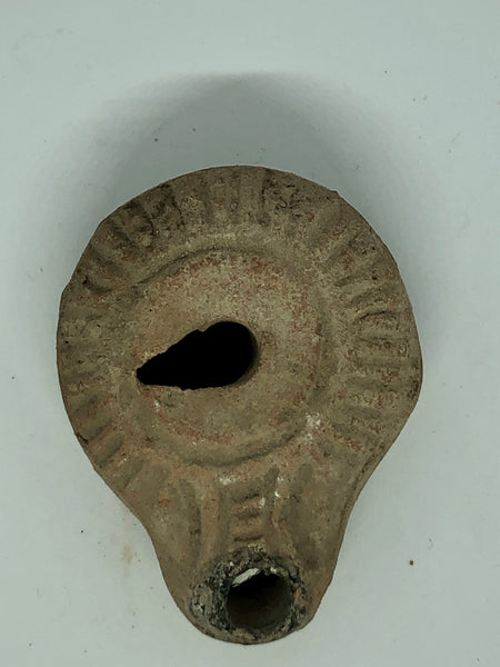 A Roman Wedding Oil Lamp, ancient Pottery. 63 BC.