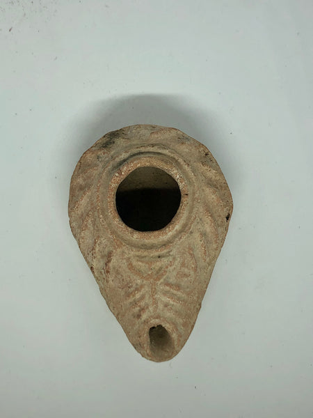 A Byzantine Oil Lamp, ancient Pottery. 330 AD.