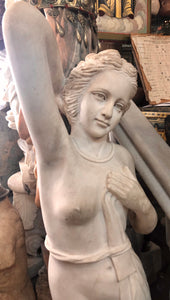 A Female cleaning herself, handmade Marble Statue.