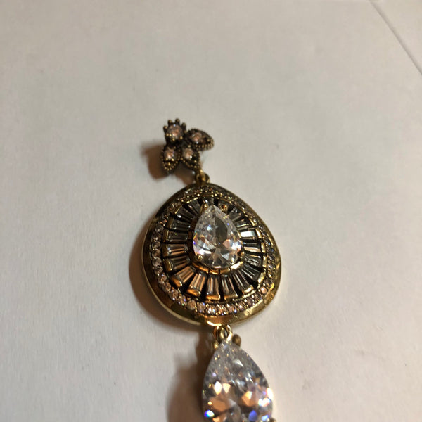 A 925 Silver Pendant with Sapphire stones.