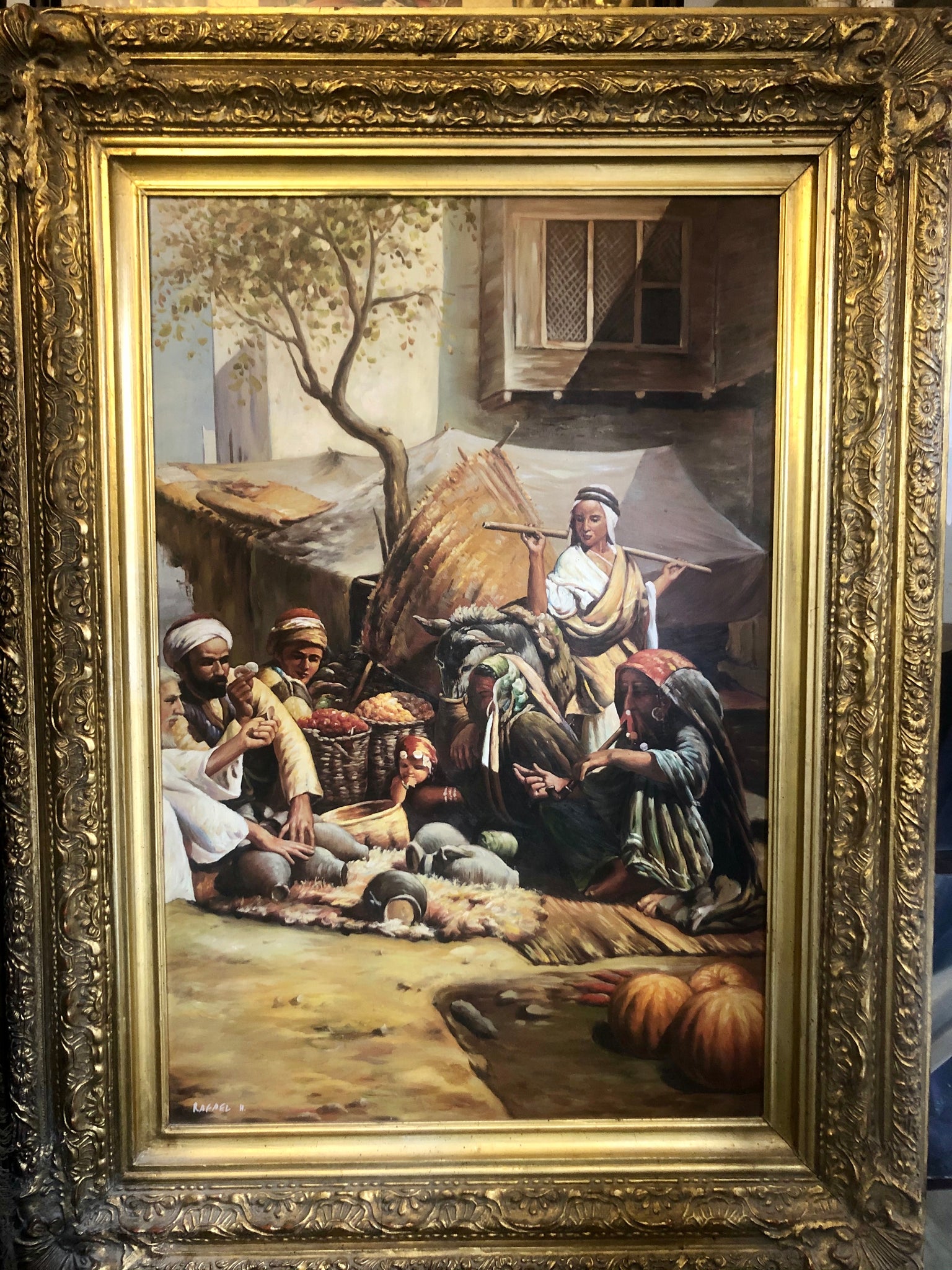 A handmade Oil-painting of an Arabian family in the desert.