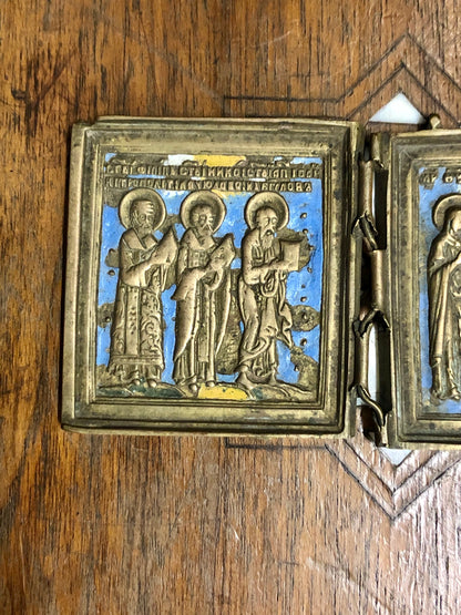 A handmade Bronze Russian Folded icon of The three Evangelist, Diocese and The angel Gabriel. 19th Century.