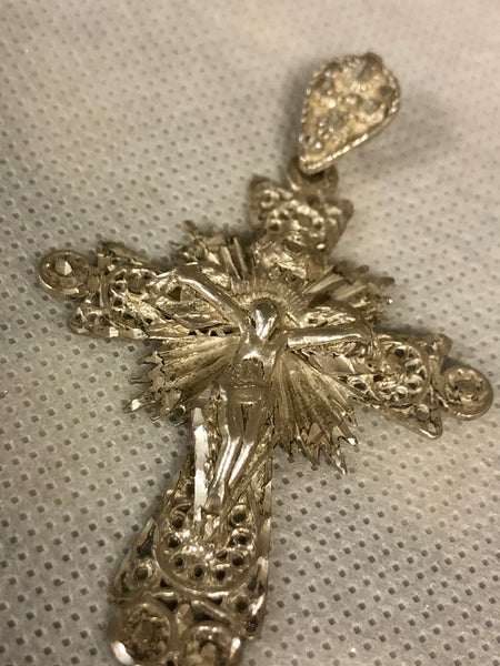 A 925 silver cross pendant.