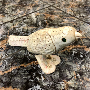 A Bird made out of pure Ivory. 80 years old.