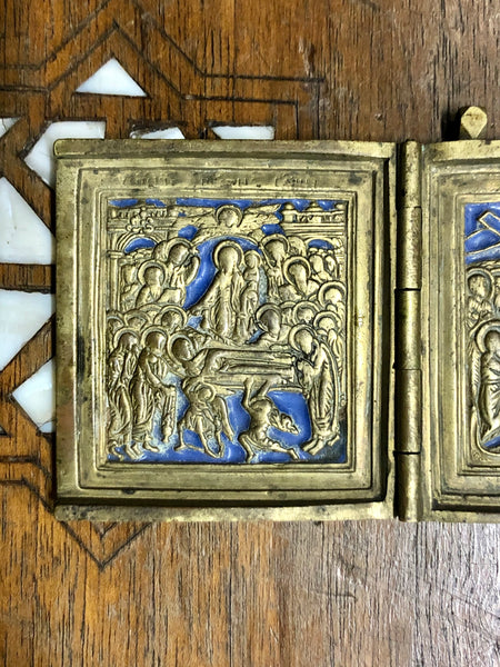 A handmade Bronze Russian Folded icon of the Dormition of Virgin Mary, Jesus's Transfiguration and The Baptism. 18th Century.