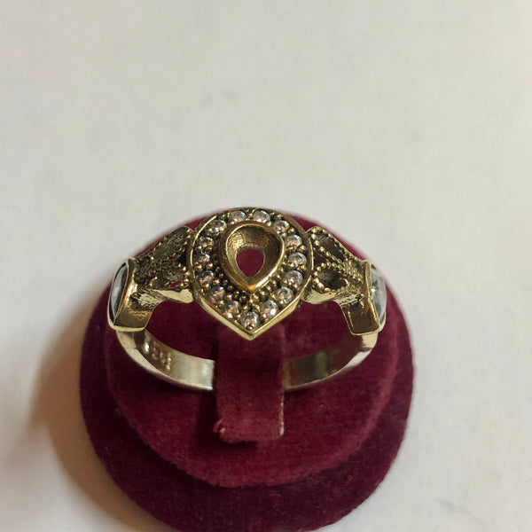 A 925 Silver Ring with Sapphire stones.