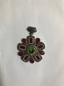 A 925 Silver Pendant with Sapphire stones.