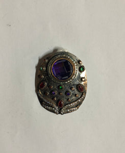 A 925 Silver Pendant with Sapphire stones.