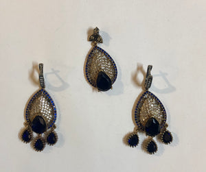 A 925 Silver set of a Pendant and Earrings with Sapphire Stones.