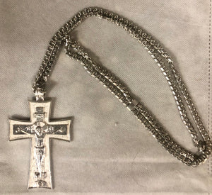 A 925 Silver cross with silver chain.