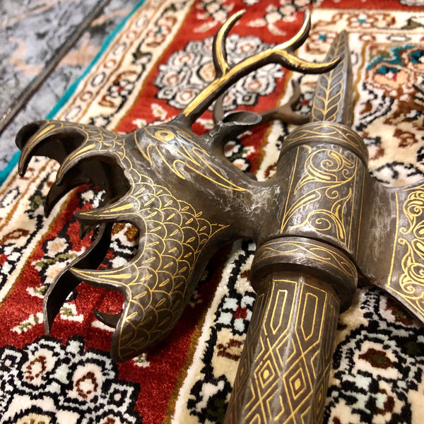 An Antique Syrian Warrior's set of a Shield with Axe and Hand protector. Made out of Bronze and Gold.
